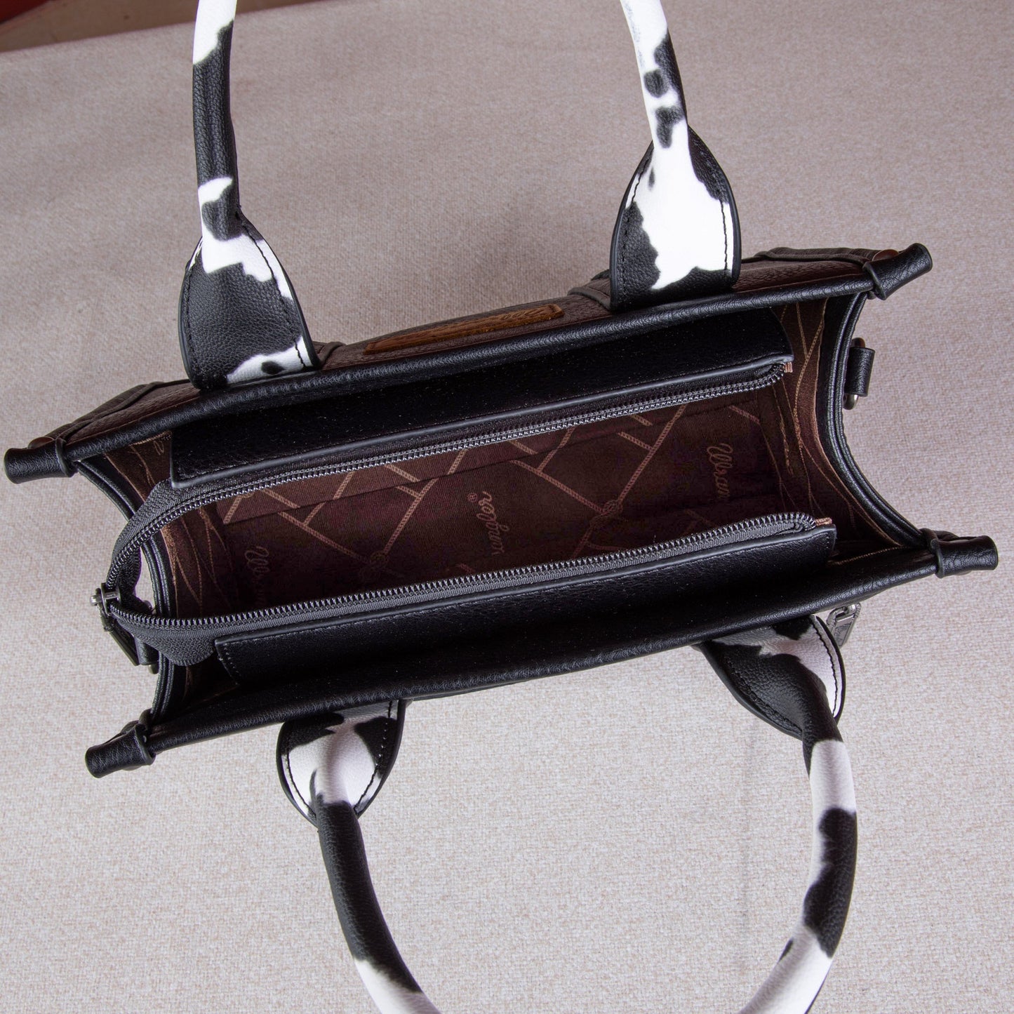 WG102-8120S Wrangler Cow Print Concealed Carry Tote/Crossbody - Black