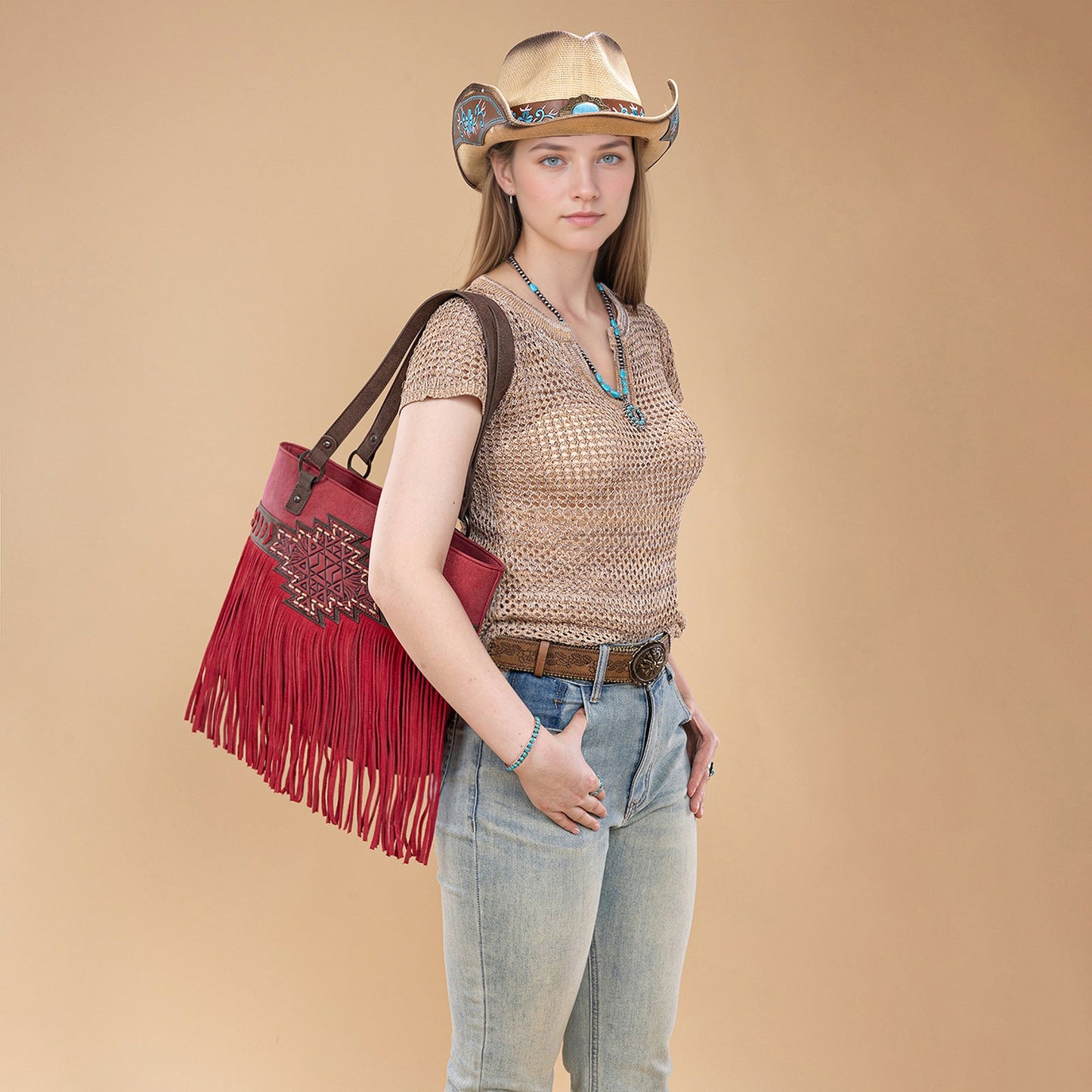 TR196G-8317  Trinity Ranch  Aztec Tooled Fringe Concealed Carry Tote