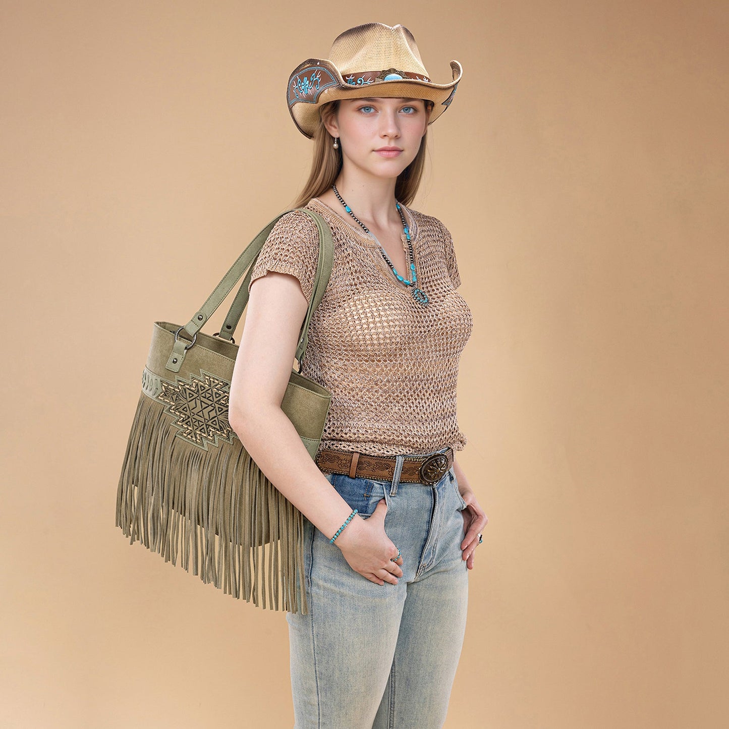 TR196G-8317  Trinity Ranch  Aztec Tooled Fringe Concealed Carry Tote