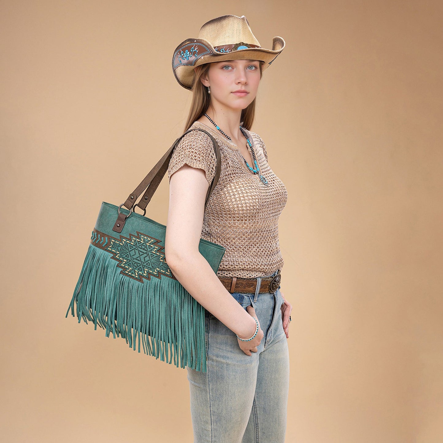 TR196G-8317  Trinity Ranch  Aztec Tooled Fringe Concealed Carry Tote