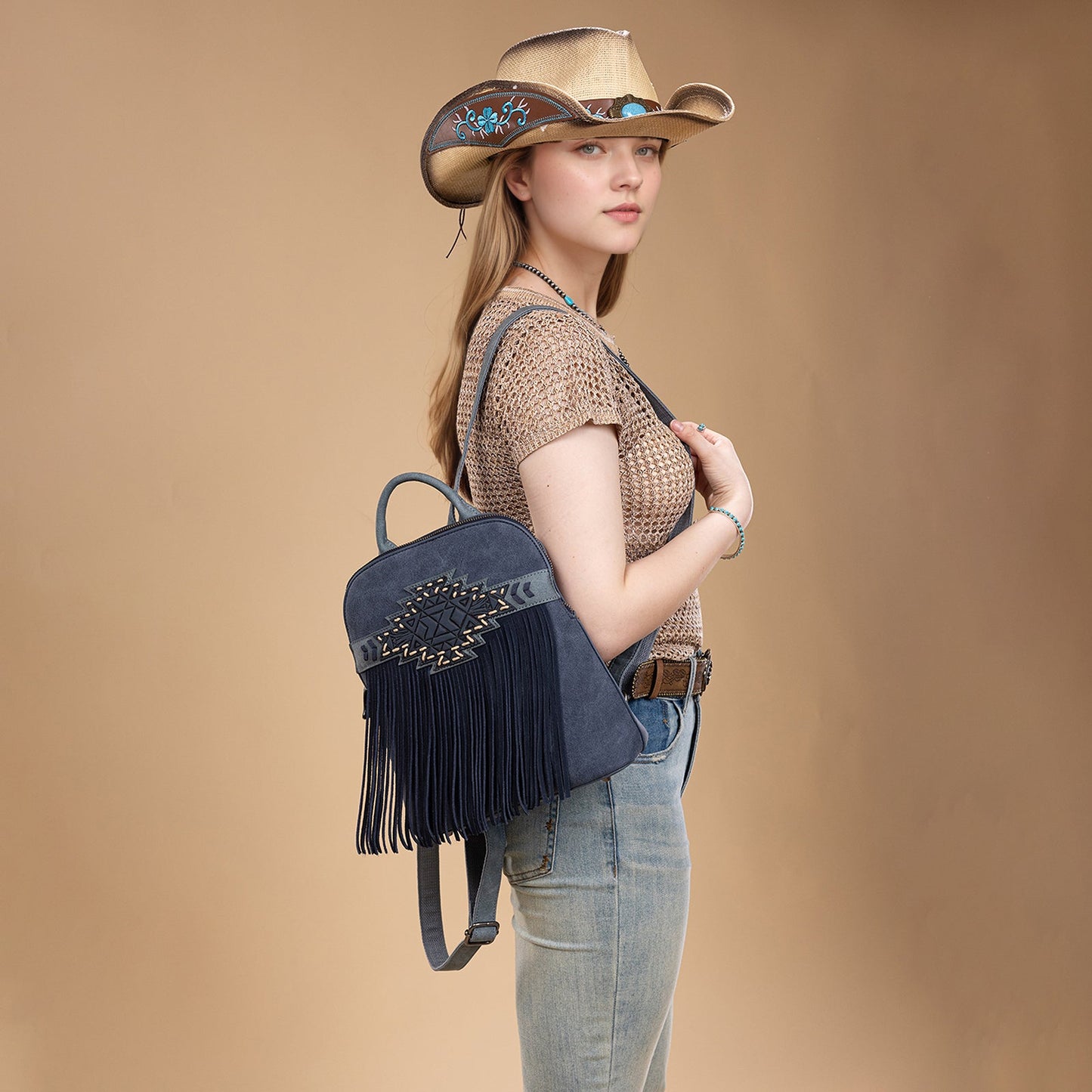 TR196G-9115  Trinity Ranch Aztec Tooled Fringe Concealed Carry Backpack