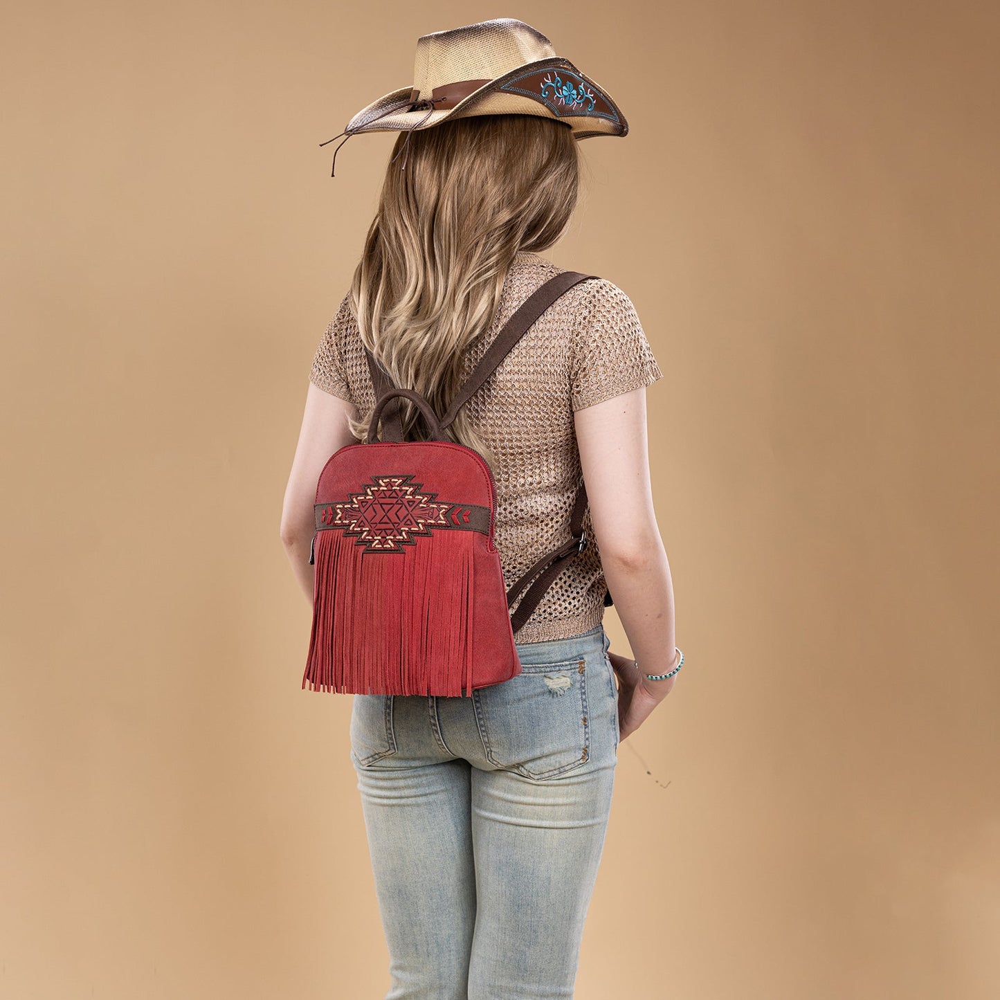 TR196G-9115  Trinity Ranch Aztec Tooled Fringe Concealed Carry Backpack