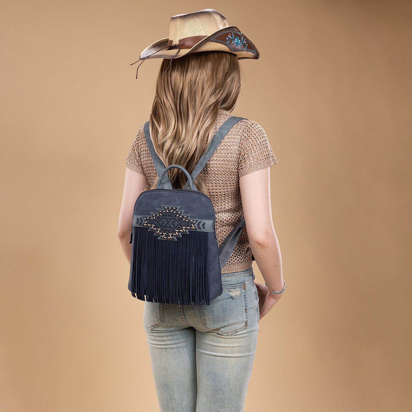 TR196G-9115  Trinity Ranch Aztec Tooled Fringe Concealed Carry Backpack