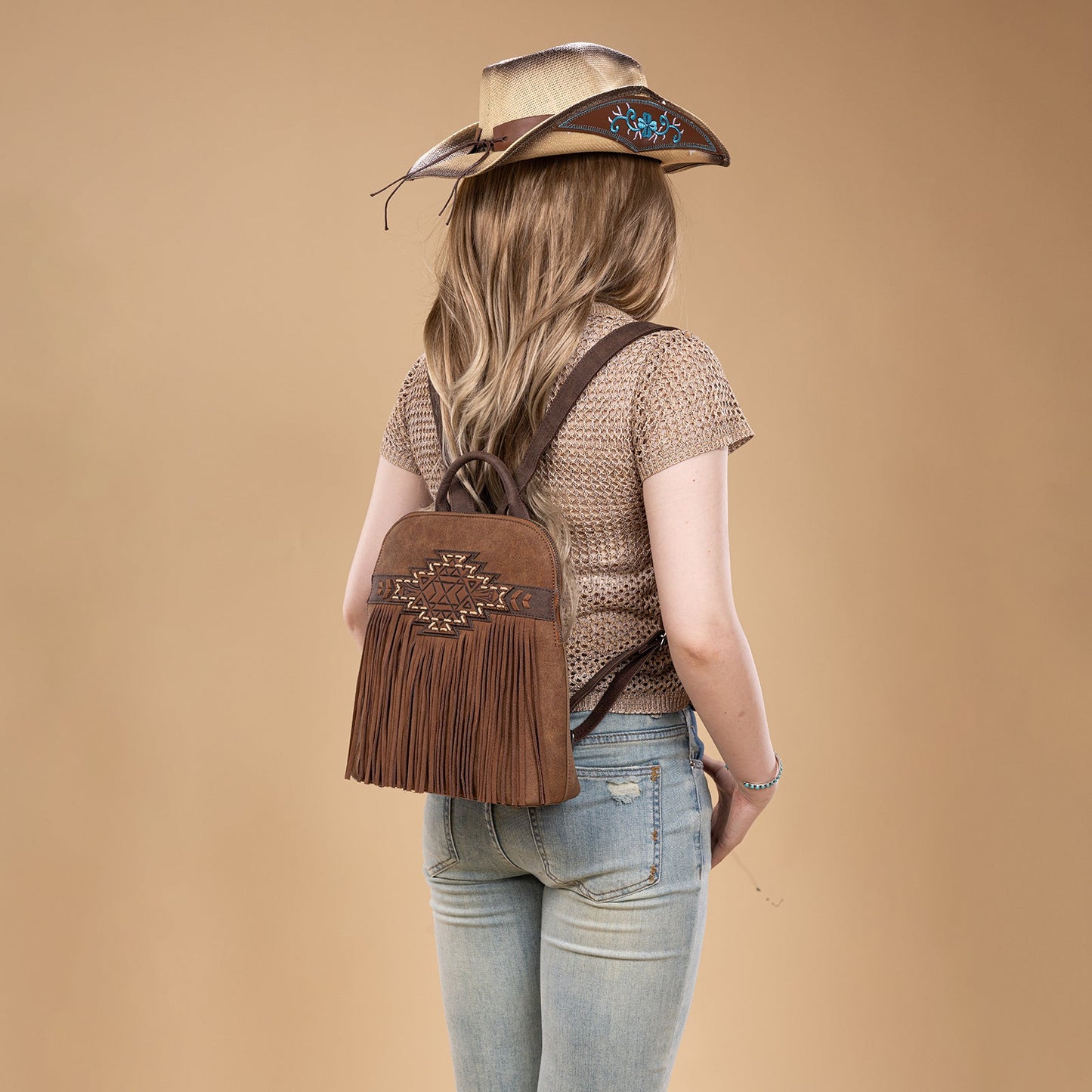 TR196G-9115  Trinity Ranch Aztec Tooled Fringe Concealed Carry Backpack