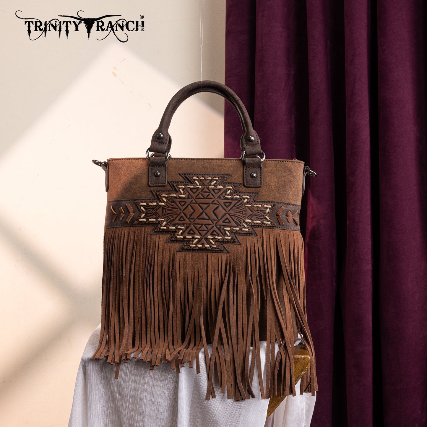 TR196G-8260  Trinity Ranch  Aztec Tooled Fringe Concealed Carry Tote/Crossbody