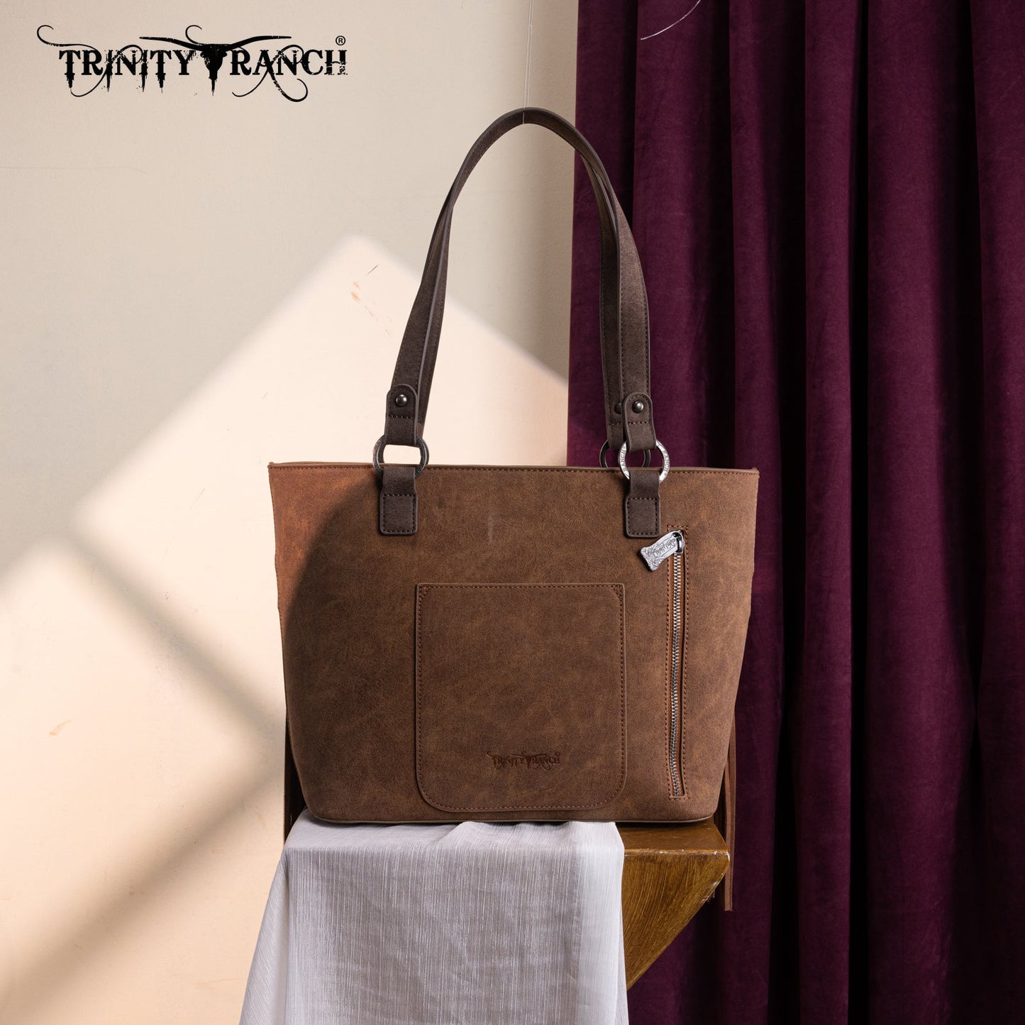 TR196G-8317  Trinity Ranch  Aztec Tooled Fringe Concealed Carry Tote