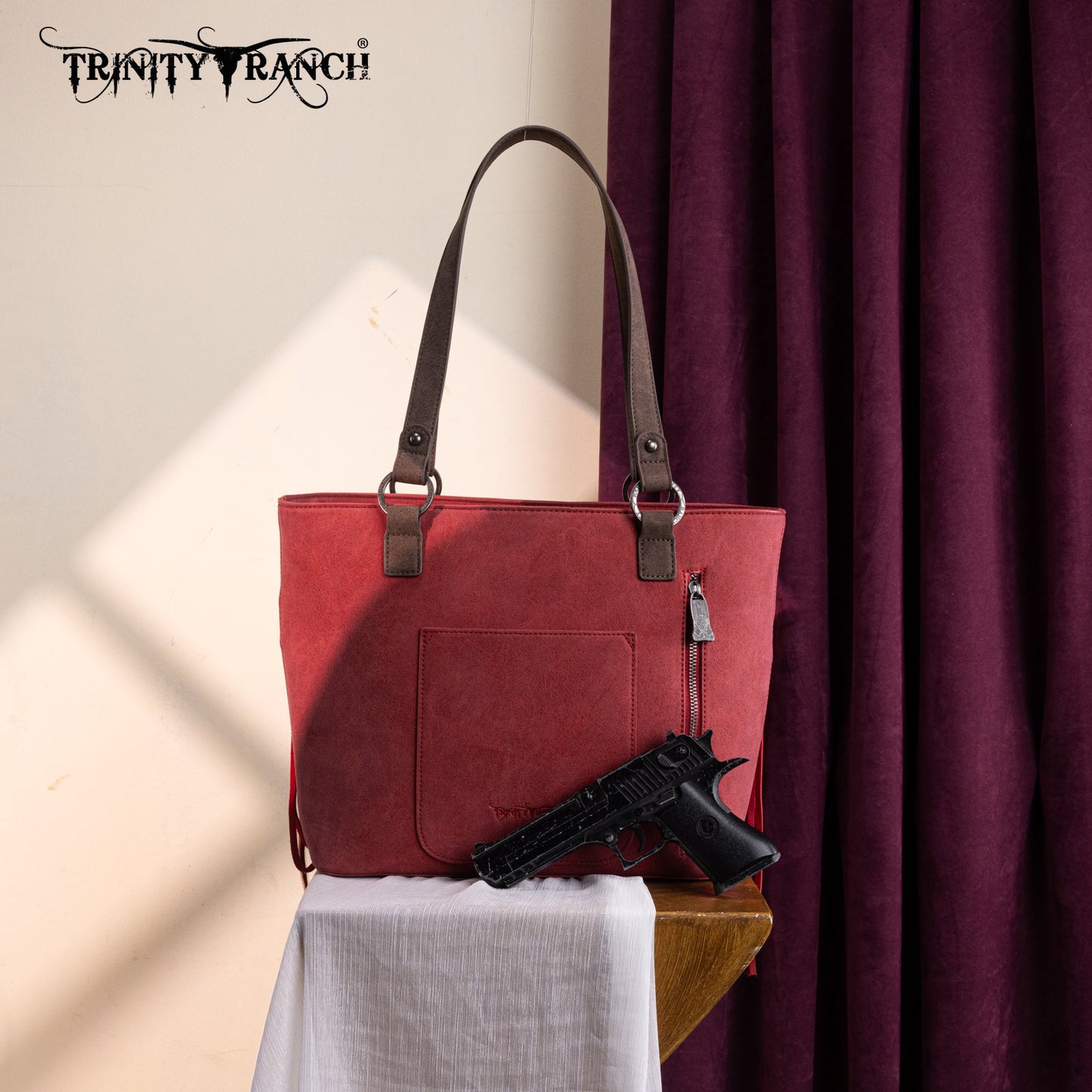 TR196G-8317  Trinity Ranch  Aztec Tooled Fringe Concealed Carry Tote