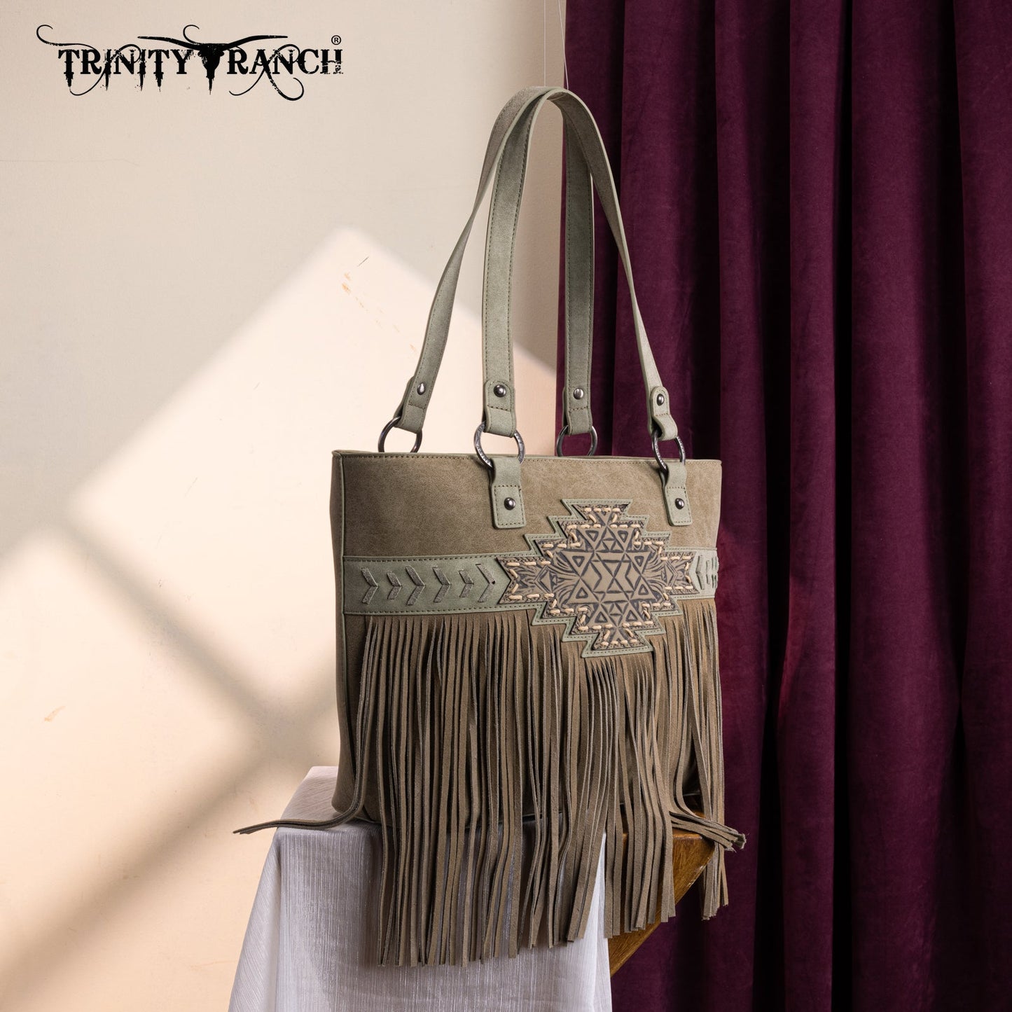 TR196G-8317  Trinity Ranch  Aztec Tooled Fringe Concealed Carry Tote
