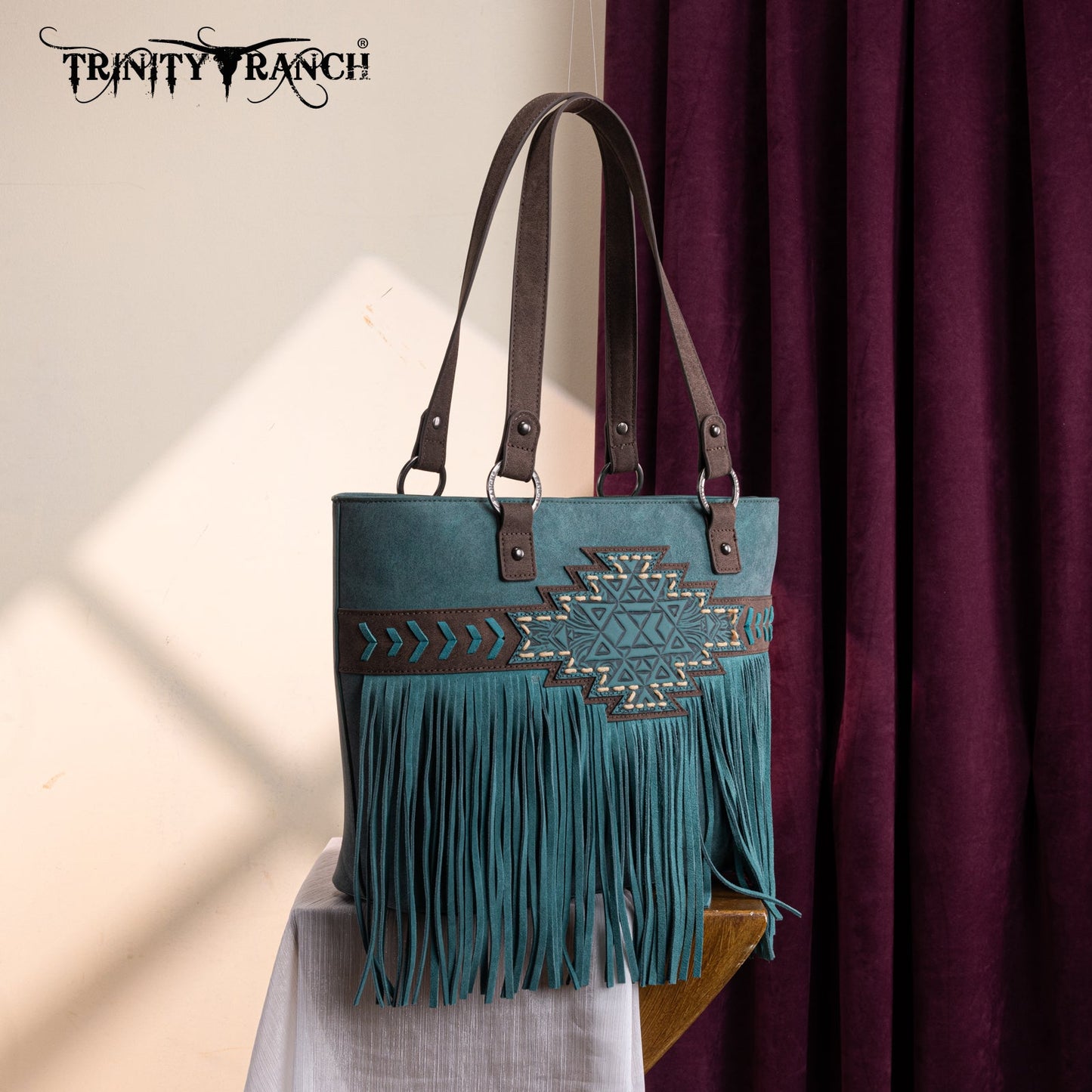 TR196G-8317  Trinity Ranch  Aztec Tooled Fringe Concealed Carry Tote