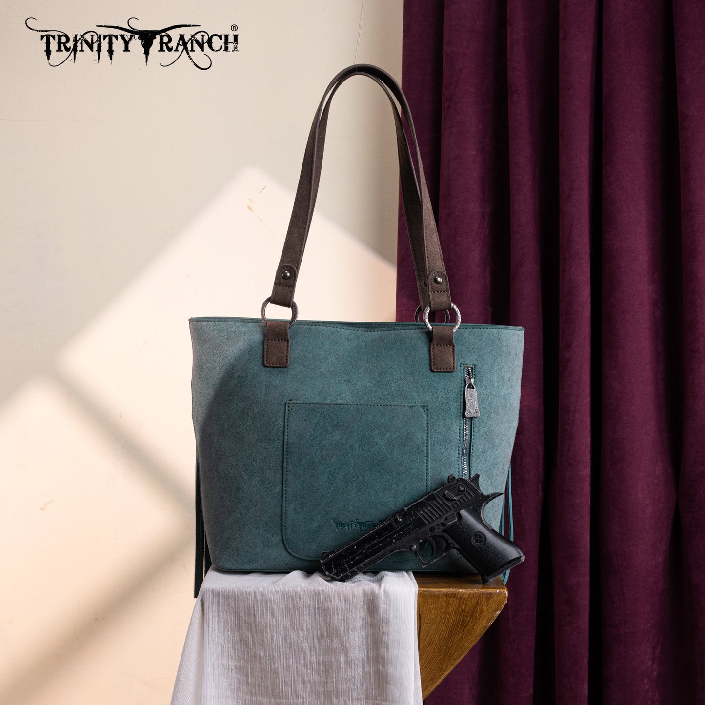 TR196G-8317  Trinity Ranch  Aztec Tooled Fringe Concealed Carry Tote